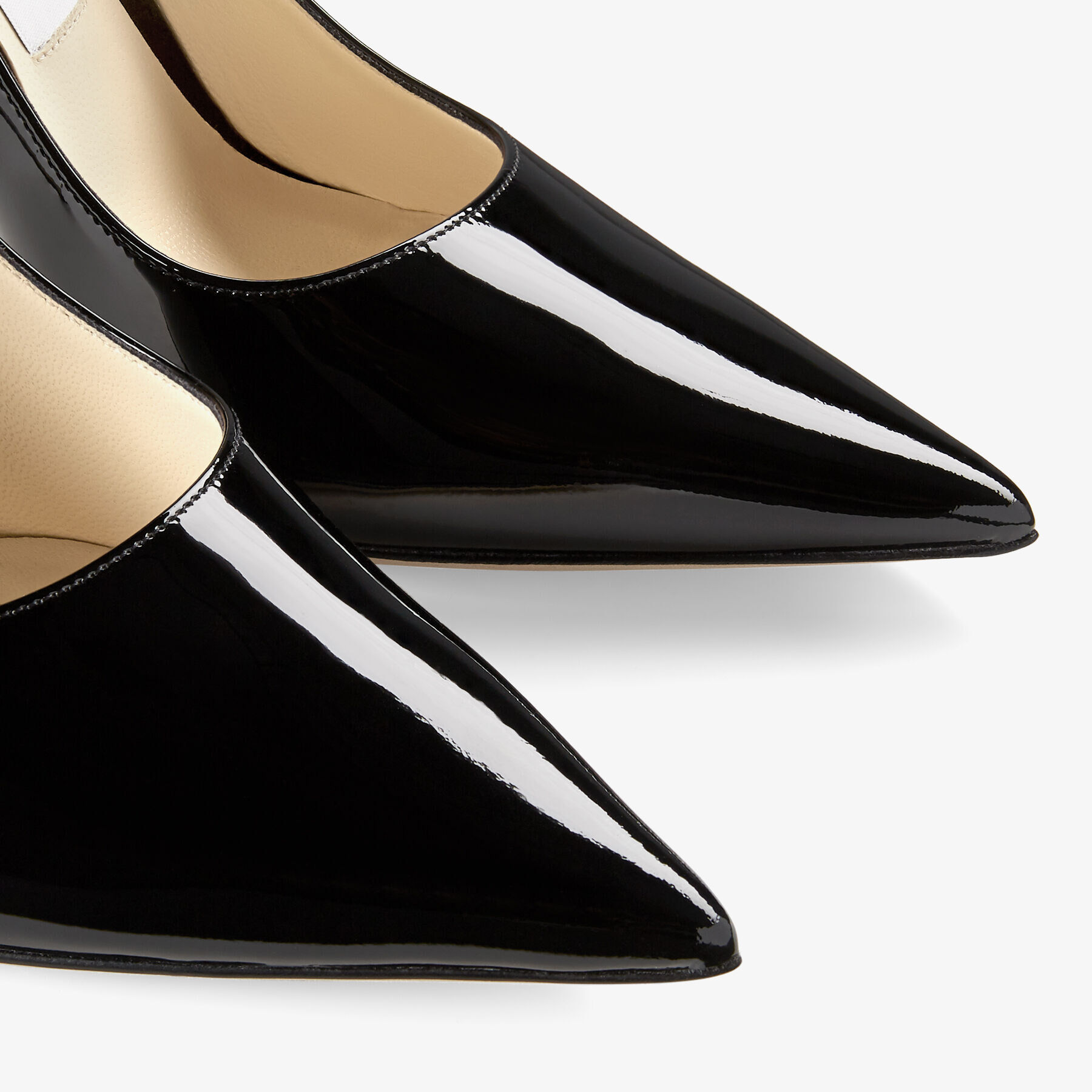 Black Patent Leather Pointed-Toe Pumps with JC Emblem | LOVE 100